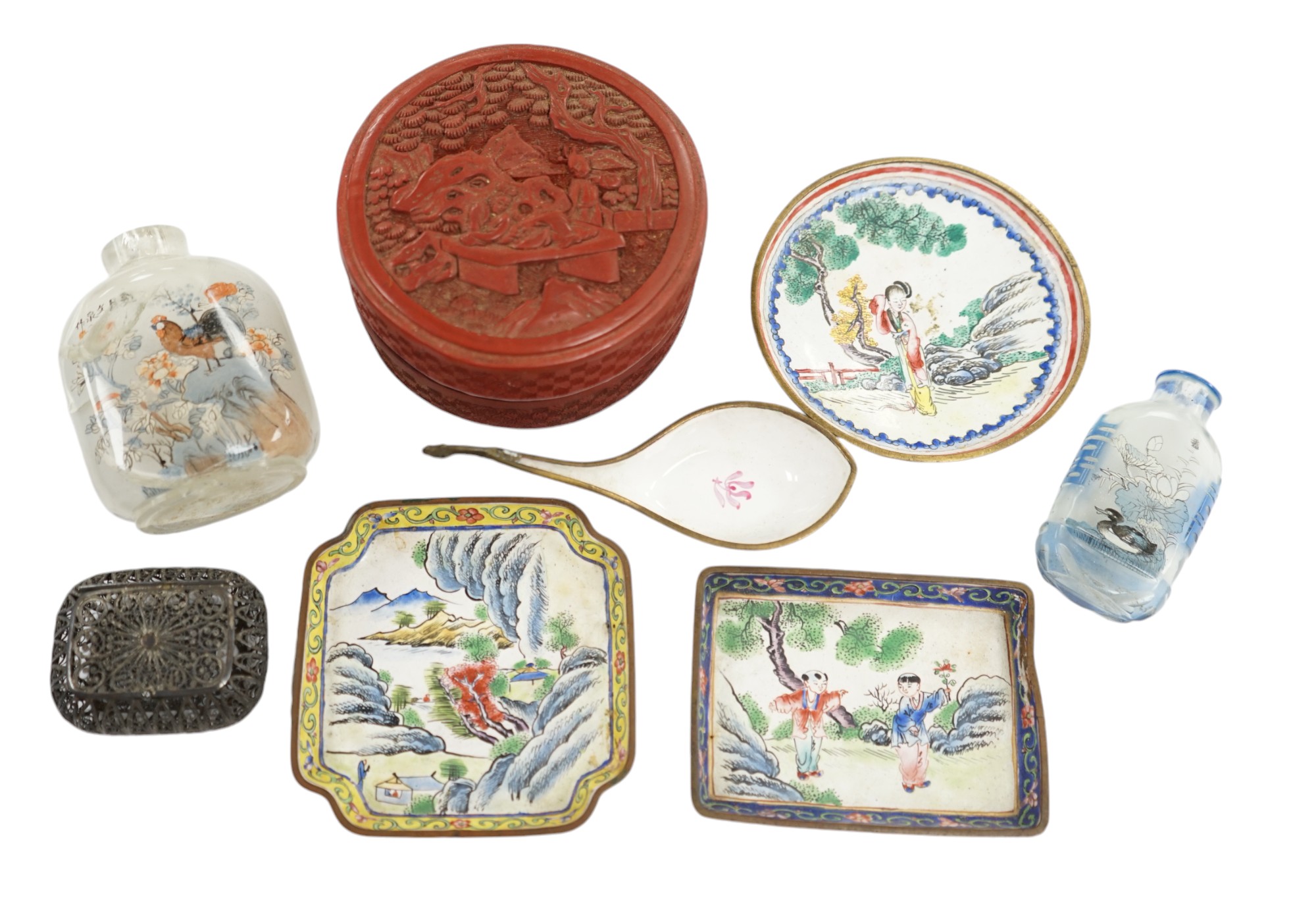 A group of Chinese Canton enamel trays, a Chinese lacquer box and cover, snuff bottles, two filigree work boxes, and a champlevé enamel box and cover, largest 10cm in diameter. Condition - varies